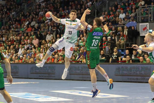 21 12 2025, xgox, Handball Daikin HBL SC Magdeburg SC DHfK Leipzig emspor, v l Matej Klima Leipzig, 13 throws goal, goal scorer, scores goal, scores the goal Magdeburg