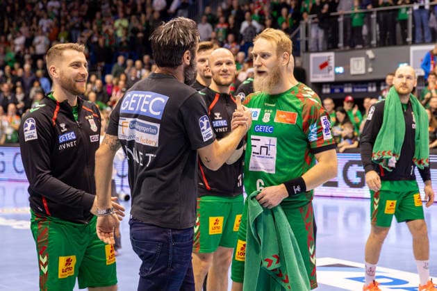 21 12 2025, xgox, Handball Daikin HBL SC Magdeburg SC DHfK Leipzig emspor, f l Bennet Wiegert Magdeburg, coach and Matthias Musche Magdeburg, 6 Cheering about the victory, cheering after the end of the game Magdeburg