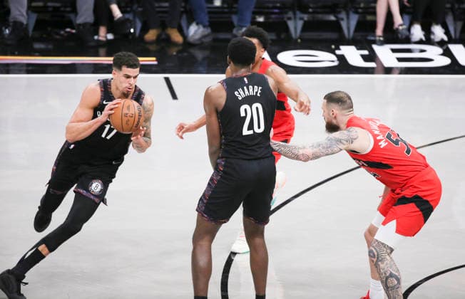 (251222) -- NEW YORK, Dec. 22, 2025 -- Michael Porter Jr. (1st L) of Brooklyn Nets dribbles during the 2025-2026 NBA, Basketball Herren, USA regular season game between Brooklyn Nets and Toronto Raptors in New York, the United States, Dec. 21, 2025. ) (SP)U.S.-NEW YORK-BASKETBALL-NBA-RAPTORS VS NETS ZhangxFengguo 