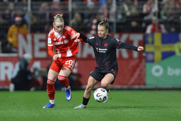 Franziska Kett FC Bayern München and 11k battle for the ball during the Woman Bundesliga match between Bayer 04 Leverkusen and Bayern München at Ulrich Haberland Stadion on December 22, 2025 in Leverkusen, Germany, Germany Photo by Oliver Kaelke DeFodi Images Franziska Kett FC Bayern München and 11k battle for the ball during the Woman Bundesliga match between Bayer 04 Leverkusen and Bayern München at Ulrich Haberland Stadion on December 22, 2025 in Leverkusen, Germany Photo by Oliver Kaelke DeFodi Images DFL regulations prohibit any use of photographs as image sequences and or quasi video Photo by Oliver Kaelke DeFodi Images