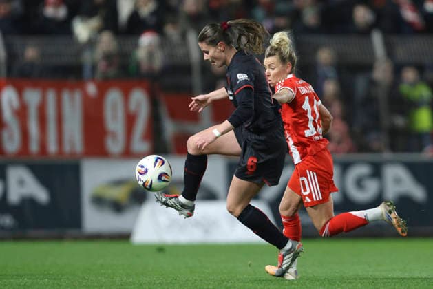 Katharina PiljiÄ‡ Bayer 04 Leverkusen and Linda Dallmann FC Bayern Munich in a duel during the Women Bundesliga match between Bayer 04 Leverkusen and Bayern Munich, Ulrich Haberland Stadion on December 22, 2025 in Leverkusen, Germany Photo by Oliver Kaelke DeFodi Images Katharina PiljiÄ‡ Bayer 04 Leverkusen and Linda Dallmann FC Bayern München battle for the ball during the Woman Bundesliga match between Bayer 04 Leverkusen and Bayern München at Ulrich Haberland Stadion on December 22, 2025 in Leverkusen, Germany Photo by Oliver Kaelke DeFodi Images DFL regulations prohibit any use of photographs as image sequences and or quasi video Photo by Oliver Kaelke DeFodi Images