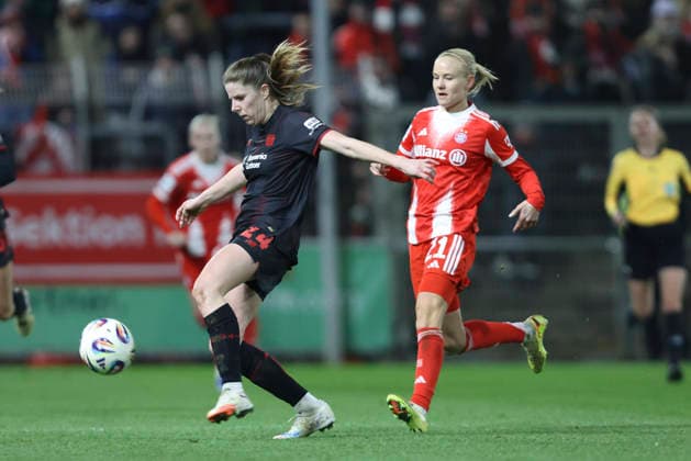 Lilla Turanyi Bayer 04 Leverkusen and Pernille Harder FC Bayern Munich battle for the ball during the Woman Bundesliga match between Bayer 04 Leverkusen and Bayern Munich, Ulrich Haberland Stadion on December 22, 2025 in Leverkusen, Germany, Germany Photo by Oliver Kaelke DeFodi Images Lilla Turanyi Bayer 04 Leverkusen and Pernille Harder FC Bayern München battle for the ball during the Woman Bundesliga match between Bayer 04 Leverkusen and Bayern München at Ulrich Haberland Stadion on December 22, 2025 in Leverkusen, Germany Photo by Oliver Kaelke DeFodi Images DFL regulations prohibit any use of photographs as image sequences and or quasi video Photo by Oliver Kaelke DeFodi Images