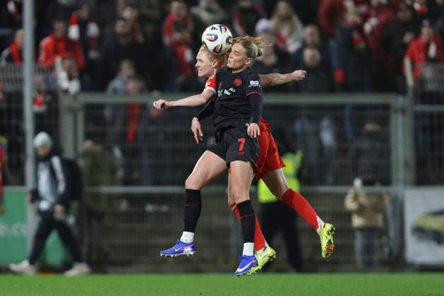 Cornelia Kramer Bayer 04 Leverkusen and Stine Ballisager Pedersen FC Bayern Munich battle for the ball during the Woman Bundesliga match between Bayer 04 Leverkusen and Bayern Munich, Ulrich Haberland Stadion on December 22, 2025 in Leverkusen, Germany, Germany Photo by Oliver Kaelke DeFodi Images Cornelia Kramer Bayer 04 Leverkusen and Stine Ballisager Pedersen FC Bayern München battle for the ball during the Woman Bundesliga match between Bayer 04 Leverkusen and Bayern München at Ulrich Haberland Stadion on December 22, 2025 in Leverkusen, Germany Photo by Oliver Kaelke DeFodi Images DFL regulations prohibit any use of photographs as image sequences and or quasi video Photo by Oliver Kaelke DeFodi Images