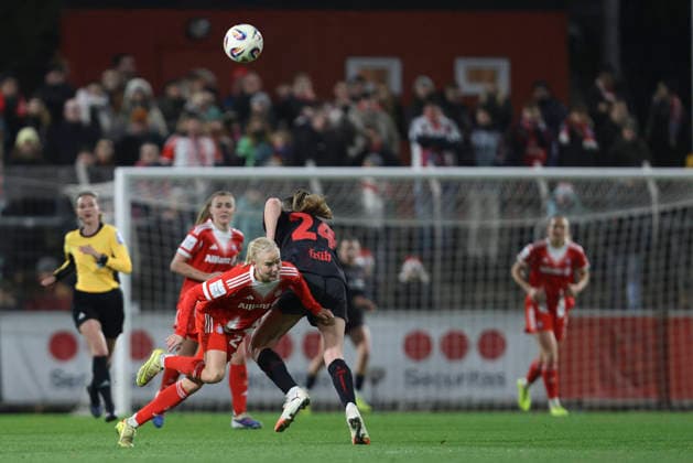 Pernille Harder FC Bayern München and Lilla Turanyi Bayer 04 Leverkusen battle for the ball during the Woman Bundesliga match between Bayer 04 Leverkusen and Bayern München, Ulrich Haberland Stadion on December 22, 2025 in Leverkusen, Germany, Germany Photo by Oliver Kaelke DeFodi Images Pernille Harder FC Bayern München and Lilla Turanyi Bayer 04 Leverkusen battle for the ball during the Woman Bundesliga match between Bayer 04 Leverkusen and Bayern München at Ulrich Haberland Stadion on December 22, 2025 in Leverkusen, Germany Photo by Oliver Kaelke DeFodi Images DFL regulations prohibit any use of photographs as image sequences and or quasi video Photo by Oliver Kaelke DeFodi Images