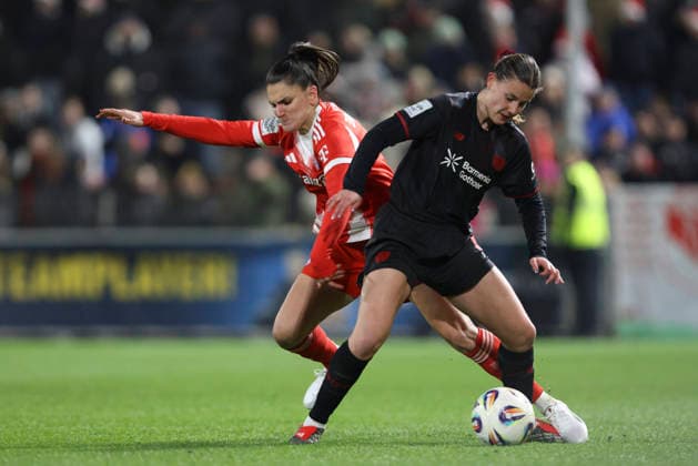 Jovana DamnjanoviÄ‡ FC Bayern Munich and Katharina PiljiÄ‡ Bayer 04 Leverkusen in a duel during the Womens Bundesliga match between Bayer 04 Leverkusen and Bayern Munich, Ulrich Haberland Stadion on December 22, 2025 in Leverkusen, Germany, Germany Photo by Oliver Kaelke DeFodi Images Jovana DamnjanoviÄ‡ FC Bayern München and Katharina PiljiÄ‡ Bayer 04 Leverkusen battle for the ball during the Woman Bundesliga match between Bayer 04 Leverkusen and Bayern München at Ulrich Haberland Stadion on December 22, 2025 in Leverkusen, Germany Photo by Oliver Kaelke DeFodi Images DFL regulations prohibit any use of photographs as image sequences and or quasi video Photo by Oliver Kaelke DeFodi Images
