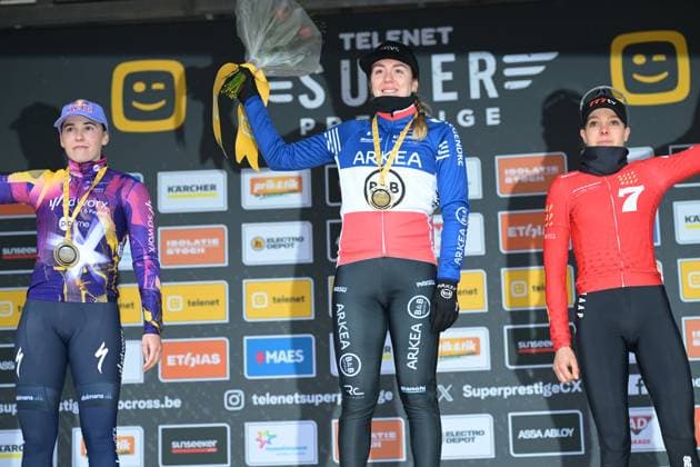 Hungarian Kata Blanka Vas, French Amandine Fouquenet and Dutch Aniek Van Alphen celebrate on the podium after the women elite race at the cyclocross cycling event in Heusden-Zolder, stage 5 8 in the Superprestige competition, Tuesday 23 December 2025. DAVIDxPINTENS  x150969345x
