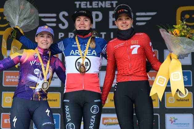 Hungarian Kata Blanka Vas, French Amandine Fouquenet and Dutch Aniek Van Alphen celebrate on the podium after the women elite race at the cyclocross cycling event in Heusden-Zolder, stage 5 8 in the Superprestige competition, Tuesday 23 December 2025. DAVIDxPINTENS  x150969458x