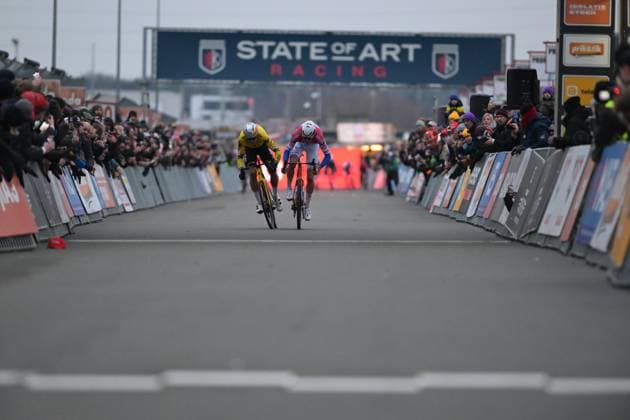 Belgian Wout van Aert, Dutch Tibor Del Grosso and pictured during the final sprint of the men elite race at the cyclocross cycling event in Heusden-Zolder, stage 5 8 in the Superprestige competition, Tuesday 23 December 2025. DAVIDxPINTENS  x150983005x