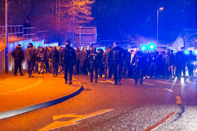 23 12 2025, xomx, Basketball EuroCup, Niners Chemnitz Besiktas JK Istanbul v l The visiting fans arrive at Messe Chemnitz Chemnitz with a fan march and a large police contingent