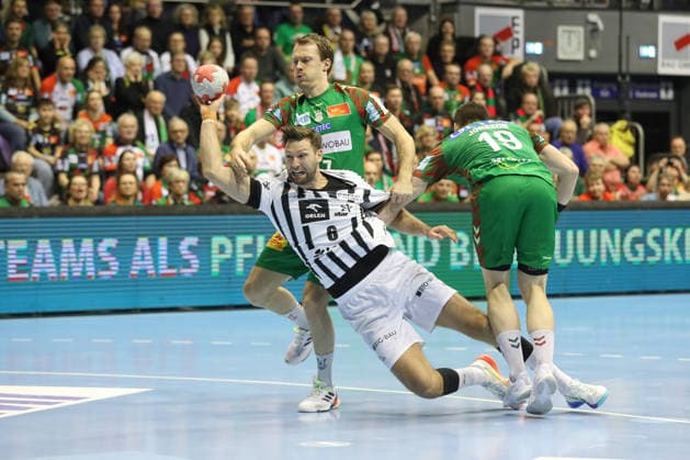 23 12 2025, xtgx, SC Magdeburg THW Kiel v l Felix Claar Magdeburg, 7 , Harald Reinkind Kiel, 6 , Elvar Orn Jonsson Magdeburg, 19 duel, duel, fight, tackle Magdeburg