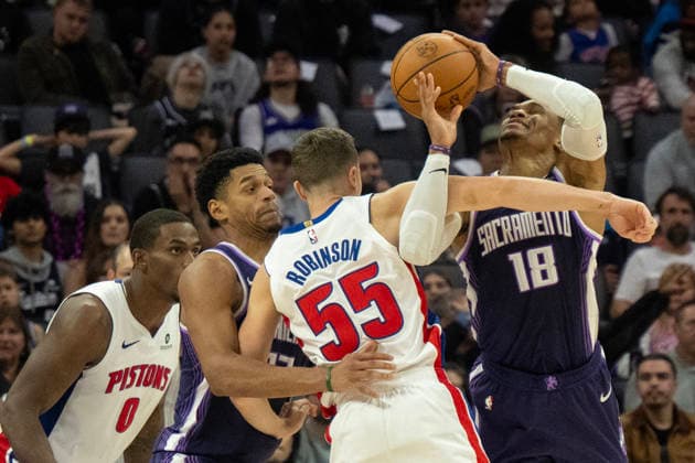 December 23, 2025, Sacramento, Ca, USA: Detroit Pistons forward Duncan Robinson (55) fouls Sacramento Kings guard Russell Westbrook (18) in the second half during a game at Golden 1 Center on Tuesday, Dec. 23, 2025 in Sacramento. Sacramento USA - ZUMAj89_ 20251223_zaf_j89_021 Copyright: xPaulxKitagakixJr.x