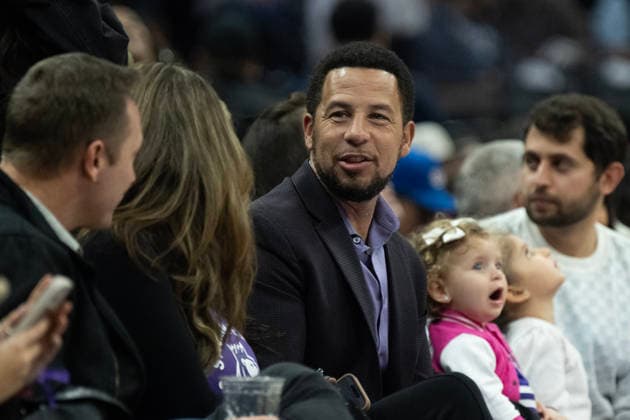 December 23, 2025, Sacramento, Ca, USA: Sacramento State President Luke Wood talks with friends in the first half during a game at Golden 1 Center on Tuesday, Dec. 23, 2025 in Sacramento. Sacramento USA - ZUMAj89_ 20251223_zaf_j89_002 Copyright: xPaulxKitagakixJr.x