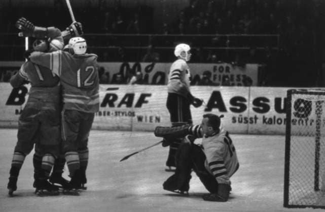 March 18-29, 1967. Vienna, Austria. Players of the Soviet national team, Nationalteam Anatoly Firsov, Viktor Polupanov and goalkeeper of the Swedish national team Leif Holmqvist, who conceded a goal, (L-R front) compete in the match between the USSR and Sweden national teams at the 34th Ice hockey, Eishockey World Championship, WM, Weltmeisterschaft The exact date of the photograph is unknown. Viktor Shandrin TASS  31982750