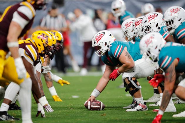 December 26, 2025: New Mexico Lobos and Minnesota Golden Gophers line up on the line of scrimmage the Rate Bowl game between New Mexico Lobos and Minnesota Golden Gophers at Chase Field in Phoneix, Arizona. . CSM. Phoneix United States of America - ZUMAc04_ 20251226_zma_c04_027 Copyright: xMichaelxCazaresx