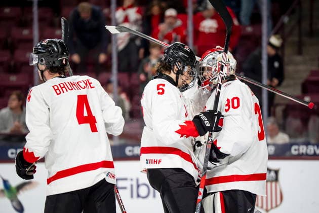 December 26, 2025, Minneapolis, Mn, Canada: Canada goaltender Carter George (30) celebrates with teammates Carson Carels (5) and Harrison Brunicke (4) after defeating Czechia in IIHF World Junior Championship hockey action, in Minneapolis, Friday, Dec. 26, 2025. Canada News - December 26, 2025  - ZUMAc35_ 20251226_zaf_c35_087 Copyright: xChristopherxKatsarovx