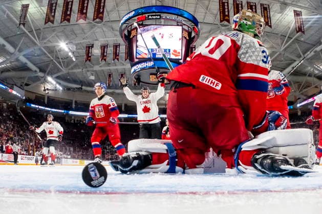December 26, 2025, Minneapolis, Mn, Canada: Canada s Porter Martone (22) celebrates a goal by teammate Tij Iginla (11), not shown, on Czechia goaltender Michal Orsulak (30) during third period IIHF World Junior Championship hockey action, in Minneapolis, Friday, Dec. 26, 2025. Canada News - December 26, 2025 - ZUMAc35_ 20251226_zaf_c35_092 Copyright: xChristopherxKatsarovx