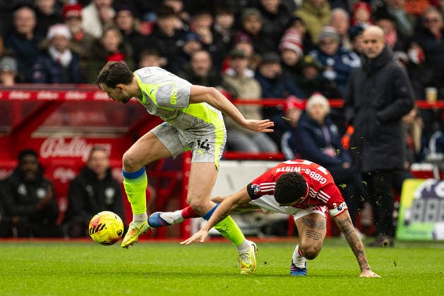 27th December 2025; The City Ground, Nottingham, England; Premier League Football, Nottingham Forest versus Manchester City; Nico Gonzalez of Manchester City avoids the challenge of Morgan Gibbs-White of Nottingham Forest  GodfreyxPitt