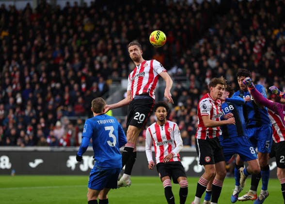 27th December 2025; Gtech Community Stadium, Brentford, London, England; Premier League Football, Brentford versus Bournemouth; Kristoffer Ajer of Brentford heads the ball from the Brentford corner  JohnxPatrickxFletcher