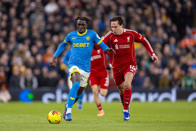 Football - FA Premier League - Liverpool FC v Wolverhampton Wanderers FC LIVERPOOL, ENGLAND - Saturday, December 27, 2025: Wolverhampton Wanderers Mateus ManÃ (L) sprints past Liverpool s Federico Chiesa during the FA Premier League match between Liverpool FC and Wolverhampton Wanderers FC at Anfield. (Photo by David Rawcliffe Propaganda) LIVERPOOL Anfield MERSEYSIDE ENGLAND  Copyright: xDavidxRawcliffex P2025-12-27-Liverpool_Wolves-53