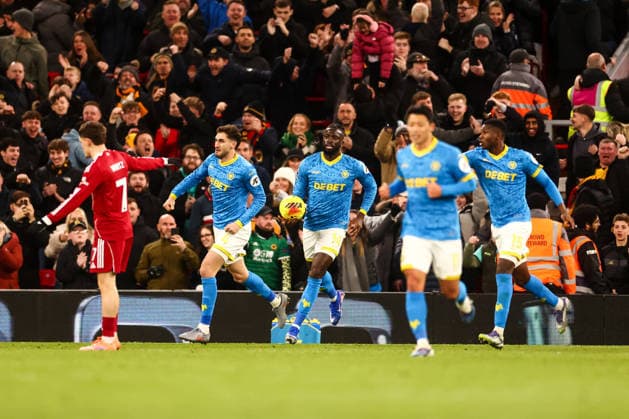 Santiago Bueno of Wolverhampton Wanderers scores his sides first goal of the match and celebrates with team mates Liverpool v Wolverhampton Wanderers, Premier League, Football, Anfield, Liverpool, UK - 27 Dec 2025Liverpool Anfield United Kingdom EDITORIAL USE ONLY No use with unauthorised audio, video, data, fixture lists, club league logos or live services. Online in-match use limited to 120 images, no video emulation. No use in betting, games or single club league player publications. Copyright: xMarkxKerton Shutterstockx 16213163bq