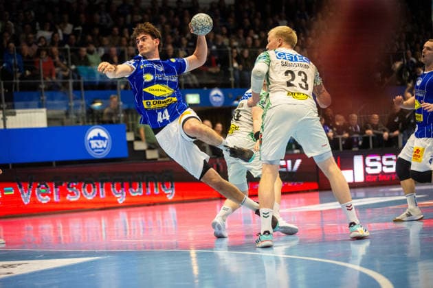 Eisenach , 271225 , Daikin HBL 1 Handball Bundesliga THSV Eisenach against SC Magdeburg In the picture Magnus Sausgstrup Magdeburg against Stephan Seitz Eisenach