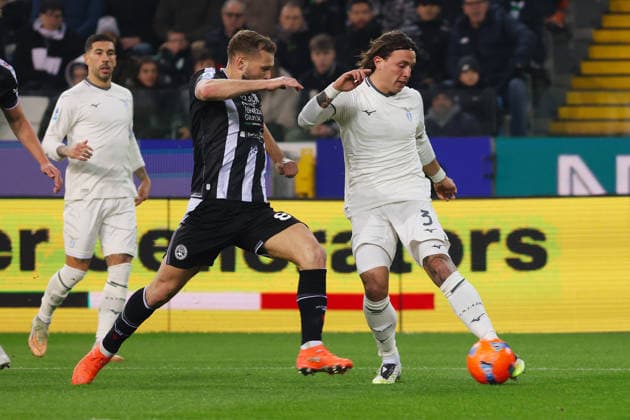 Lazio s Luca Pellegrini Udinese™s Jesper Karlstroem during the Serie A soccer match between Udinese and Lazio at the Bluenergy Stadium in Udine, north east Italy - Saturday, December 27,2025 - soccer  Copyright: xAndreaxBressanutti LaPressex