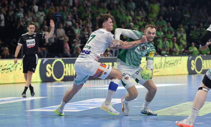 Victor Klöve, Mathias Gidsel duel Match scene Action Sport Handball HBL Bundesliga Men 19 Matchday Season 2025 2026 27 12 2025 Füchse Berlin vs Frisch Auf Göppingen