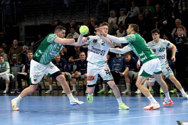 DEU, DHB, 1 HBL, Fuechse Berlin vs Frisch Auf Goeppingen, 27 12 2025, Max Schmeling Halle, Berlin, DEU, DHB, 1 HBL, Fuechse Berlin vs Frisch Auf Goeppingen, in the picture Mijajlo Marsenic Fuechse Berlin 93 , Nejc Cehte Fuechse Berlin 22 , Oskar Neudeck Frisch Auf Goeppingen 2 nordphotoxGmbHx xEngler nph00076