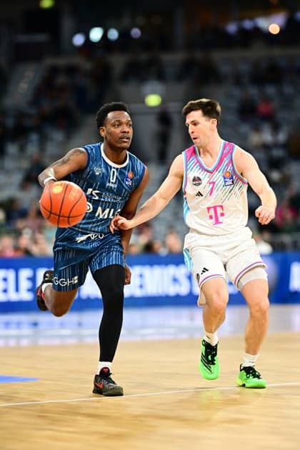 Game action with DJ Horne 0 MLP Academics Heidelberg and a player from Telekom Baskets Bonn Game action with DJ Horne 0 MLP Academics Heidelberg Copyright: xMichaelxGelhardtx