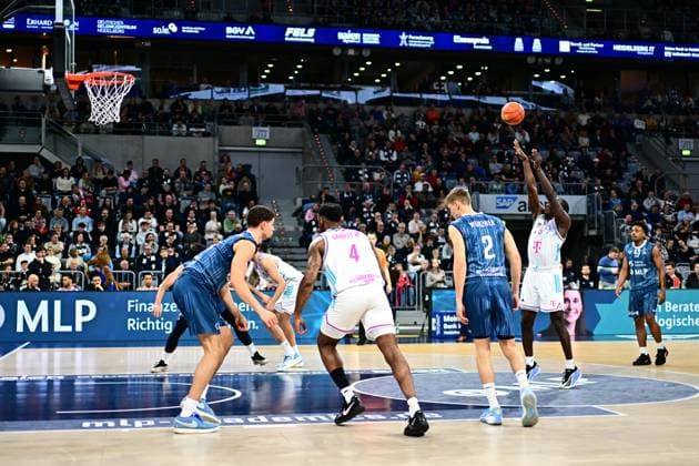 Game action with Jeff Garrett Jr 4 Telekom Baskets Bonn , Niklas Würzner 2 MLP Academics Heidelberg and Eric Reed Jr 43 MLP Academics Heidelberg Game action with Jeff Garrett Jr 4 Telekom Baskets Bonn and Niklas Würzner 2 MLP Academics Heidelberg Copyright: xMichaelxGelhardtx