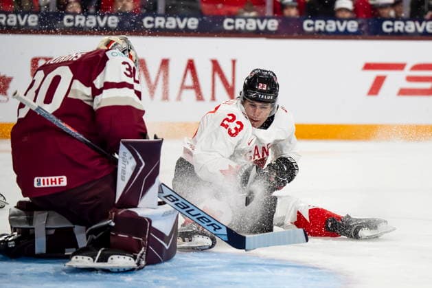 December 27, 2025, Minneapolis, Mn, Canada: Latvia goaltender Nils Maurins (30) makes a save against Canada s Sam O Reilly (23) during first period IIHF World Junior Championship hockey action, in Minneapolis, Minn., on Saturday, Dec. 27, 2025. Canada News - December 27, 2025 - ZUMAc35_ 20251227_zaf_c35_069 Copyright: xChristopherxKatsarovx