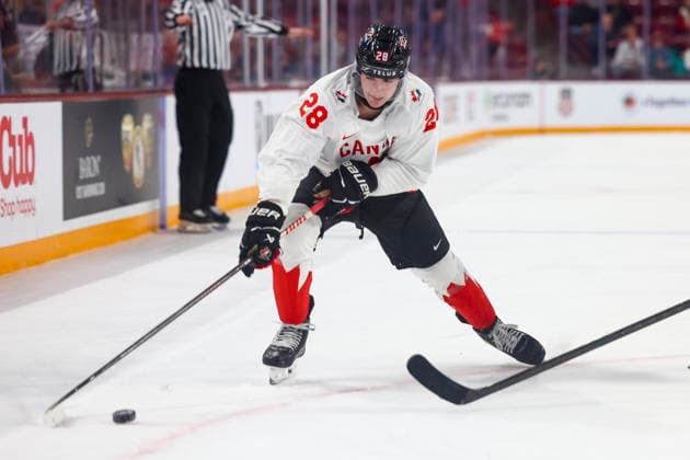 December 27, 2025, Minneapolis, Minnesota, United States: Canada forward BRADY MARTIN (28) controls the puck. Canada and Latvia faced off in the opening round of the IIHF World Junior Championship on December 27th. Canada was victorious, winning 2-1 in overtime. Minneapolis United States - ZUMAt166 20251227_zsp_t166_007 Copyright: xMichaelxTurnerx