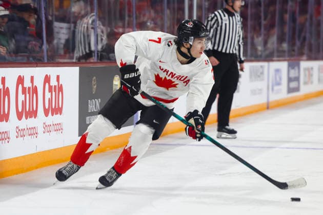 December 27, 2025, Minneapolis, Minnesota, United States: Canada forward MICHAEL MISA (7) skates with the puck. Canada and Latvia faced off in the opening round of the IIHF World Junior Championship on December 27th. Canada was victorious, winning 2-1 in overtime. Minneapolis United States - ZUMAt166 20251227_zsp_t166_015 Copyright: xMichaelxTurnerx