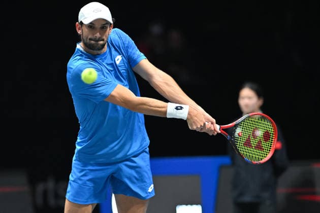 SHENZHEN, CHINA - DECEMBER 27: Valentin Vacherot of Monaco returns a shot in the Men s Singles match against Andrey Rublev on day 2 of the 2025 World Tennis Continental Cup at Shenzhen Universiade Center on December 27, 2025 in Shenzhen, Guangdong Province of China.  Copyright: xVCGx 111612220944