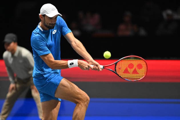SHENZHEN, CHINA - DECEMBER 27: Valentin Vacherot of Monaco returns a shot in the Men s Singles match against Andrey Rublev on day 2 of the 2025 World Tennis Continental Cup at Shenzhen Universiade Center on December 27, 2025 in Shenzhen, Guangdong Province of China.  Copyright: xVCGx 111612220913