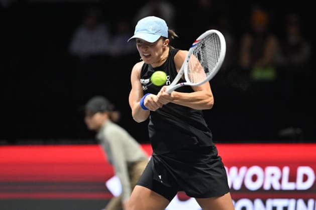 SHENZHEN, CHINA - DECEMBER 27: Iga Swiatek of Poland returns a shot in the Women s Singles match against Wang Xinyu of China on day 2 of the 2025 World Tennis Continental Cup at Shenzhen Universiade Center on December 27, 2025 in Shenzhen, Guangdong Province of China.  Copyright: xVCGx 111612196393