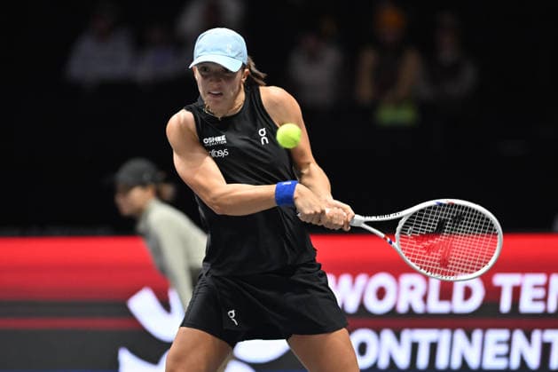 SHENZHEN, CHINA - DECEMBER 27: Iga Swiatek of Poland returns a shot in the Women s Singles match against Wang Xinyu of China on day 2 of the 2025 World Tennis Continental Cup at Shenzhen Universiade Center on December 27, 2025 in Shenzhen, Guangdong Province of China.  Copyright: xVCGx 111612196394