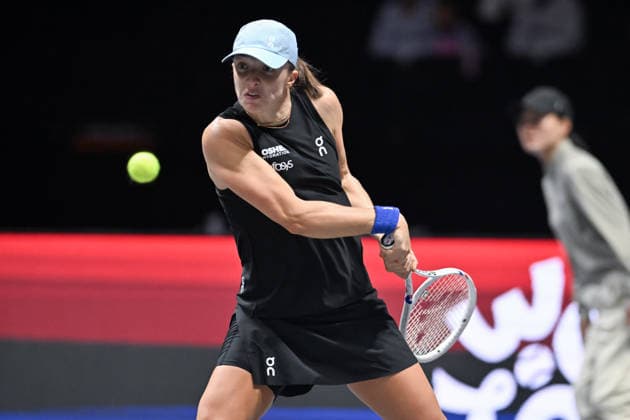 SHENZHEN, CHINA - DECEMBER 27: Iga Swiatek of Poland returns a shot in the Women s Singles match against Wang Xinyu of China on day 2 of the 2025 World Tennis Continental Cup at Shenzhen Universiade Center on December 27, 2025 in Shenzhen, Guangdong Province of China.  Copyright: xVCGx 111612196367