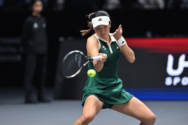 SHENZHEN, CHINA - DECEMBER 27: Wang Xinyu of China returns a shot in the Women s Singles match against Iga Swiatek of Poland on day 2 of the 2025 World Tennis Continental Cup at Shenzhen Universiade Center on December 27, 2025 in Shenzhen, Guangdong Province of China.  Copyright: xVCGx 111612196376