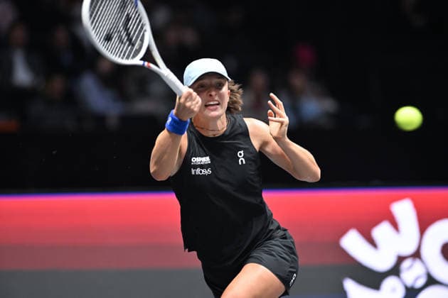 SHENZHEN, CHINA - DECEMBER 27: Iga Swiatek of Poland returns a shot in the Women s Singles match against Wang Xinyu of China on day 2 of the 2025 World Tennis Continental Cup at Shenzhen Universiade Center on December 27, 2025 in Shenzhen, Guangdong Province of China.  Copyright: xVCGx 111612196383
