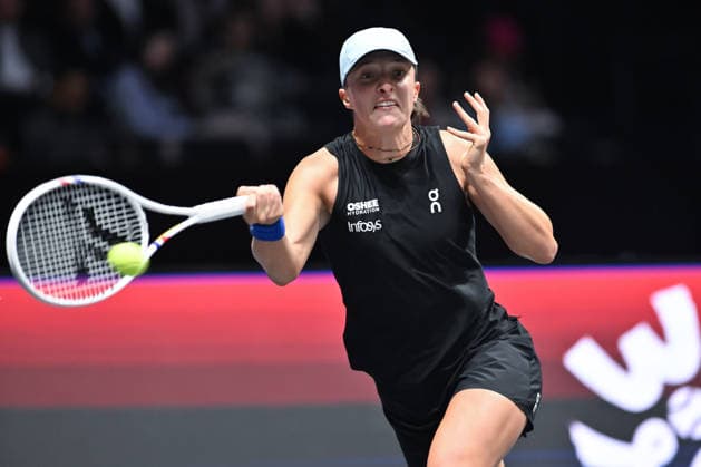 SHENZHEN, CHINA - DECEMBER 27: Iga Swiatek of Poland returns a shot in the Women s Singles match against Wang Xinyu of China on day 2 of the 2025 World Tennis Continental Cup at Shenzhen Universiade Center on December 27, 2025 in Shenzhen, Guangdong Province of China.  Copyright: xVCGx 111612196384
