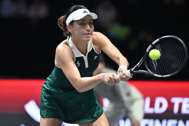 SHENZHEN, CHINA - DECEMBER 27: Wang Xinyu of China returns a shot in the Women s Singles match against Iga Swiatek of Poland on day 2 of the 2025 World Tennis Continental Cup at Shenzhen Universiade Center on December 27, 2025 in Shenzhen, Guangdong Province of China.  Copyright: xVCGx 111612196354