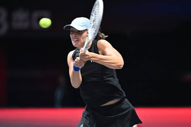 SHENZHEN, CHINA - DECEMBER 27: Iga Swiatek of Poland returns a shot in the Women s Singles match against Wang Xinyu of China on day 2 of the 2025 World Tennis Continental Cup at Shenzhen Universiade Center on December 27, 2025 in Shenzhen, Guangdong Province of China.  Copyright: xVCGx 111612196359