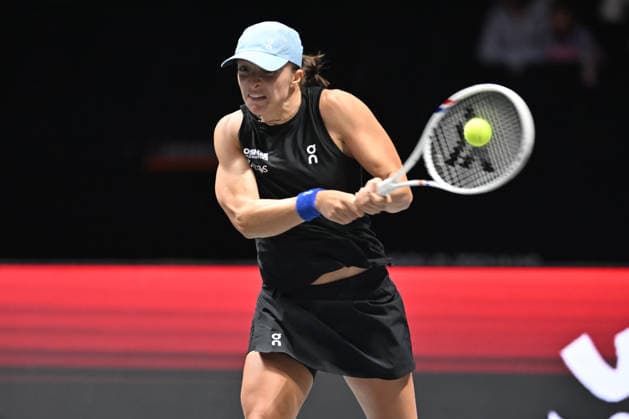 SHENZHEN, CHINA - DECEMBER 27: Iga Swiatek of Poland returns a shot in the Women s Singles match against Wang Xinyu of China on day 2 of the 2025 World Tennis Continental Cup at Shenzhen Universiade Center on December 27, 2025 in Shenzhen, Guangdong Province of China.  Copyright: xVCGx 111612196366