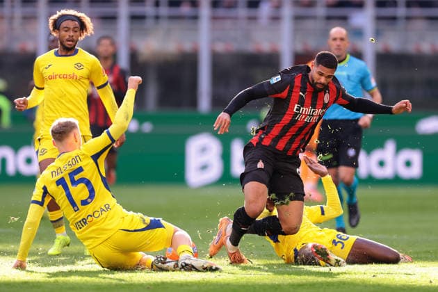 Milan, Italy, 28th December 2025. Antoine Bernede of Hellas Verona looks on as team mates Victor Nelsson and Cheikh Niasse challenge Ruben Loftus-Cheek of AC Milan during the AC Milan vs Hellas Verona Serie A match at Giuseppe Meazza, Milan. Picture credit should read: Jonathan Moscrop Sportimage EDITORIAL USE ONLY. No use with unauthorised audio, video, data, fixture lists, club league logos or live services. Online in-match use limited to 120 images, no video emulation. No use in betting, games or single club league player publications. SPI_012_JM_MILAN_VERONA SPI-4369-0012