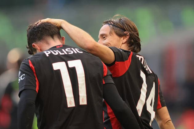 Milan, Italy, 28th December 2025. Christian Pulisic of AC Milan is congratulated by team mate Luka Modric after scoring to give the hosts a 1-0 lead the AC Milan vs Hellas Verona Serie A match at Giuseppe Meazza, Milan. Picture credit should read: Jonathan Moscrop Sportimage EDITORIAL USE ONLY. No use with unauthorised audio, video, data, fixture lists, club league logos or live services. Online in-match use limited to 120 images, no video emulation. No use in betting, games or single club league player publications. SPI_037_JM_MILAN_VERONA SPI-4369-0037