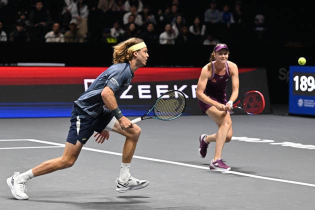 SHENZHEN, CHINA - DECEMBER 28: Elena Rybakina of Kazakhstan and Andrey Rublev return a shot in the Mixed Doubles match against Iga Swiatek of Poland and Valentin Vacherot of Monaco on day 3 of the 2025 World Tennis Continental Cup at Shenzhen Universiade Center on December 28, 2025 in Shenzhen, Guangdong Province of China.  Copyright: xVCGx 111612347931