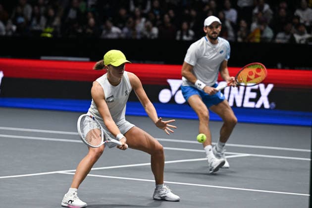 SHENZHEN, CHINA - DECEMBER 28: Iga Swiatek of Poland and Valentin Vacherot of Monaco return a shot in the Mixed Doubles match against Elena Rybakina of Kazakhstan and Andrey Rublev on day 3 of the 2025 World Tennis Continental Cup at Shenzhen Universiade Center on December 28, 2025 in Shenzhen, Guangdong Province of China.  Copyright: xVCGx 111612347933