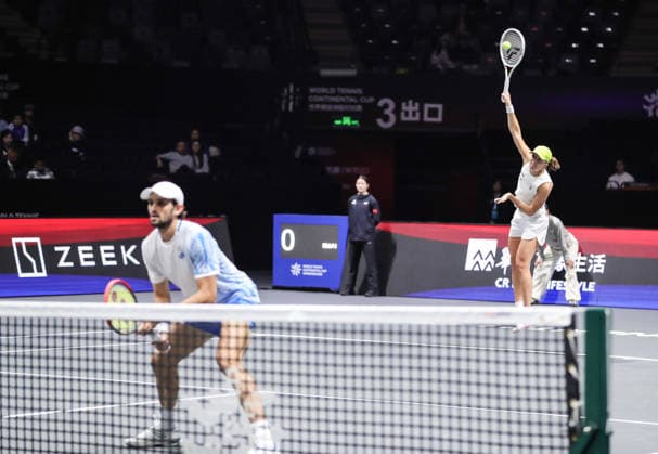 SHENZHEN, CHINA - DECEMBER 28: Iga Swiatek of Poland and Valentin Vacherot of Monaco return a shot in the Mixed Doubles match against Elena Rybakina of Kazakhstan and Andrey Rublev on day 3 of the 2025 World Tennis Continental Cup at Shenzhen Universiade Center on December 28, 2025 in Shenzhen, Guangdong Province of China.  Copyright: xVCGx 111612349537