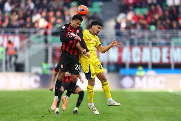 Zachary Athekame (Ac Milan) und Abdou Harroui (Hellas Verona Fc) battle for the ball, Serie A, AC Milan v Hellas Verona FC, Giuseppe Meazza, December 28, 2025, Milan, Italy.